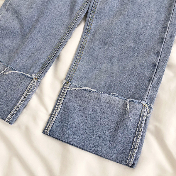 Blugi de dama cu motive rupte si talie inalta - model larg