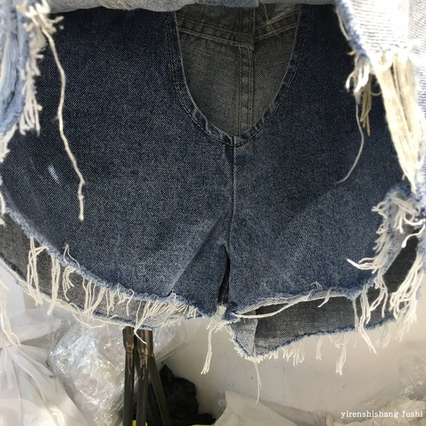 Női rövid farmer szoknya-nadrág gombokkal