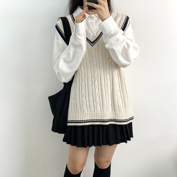 Retro moteriška liemenė su špicine iškirpte