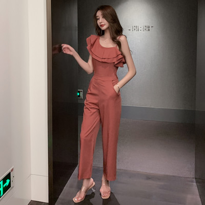 Modernus ilgas kombinezonas su garbanomis ir kišenėmis