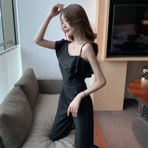 Modernus ilgas kombinezonas su garbanomis ir kišenėmis