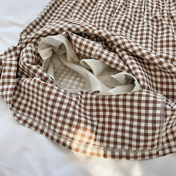 Rūtaini sieviešu garie svārki ar augstu vidukli