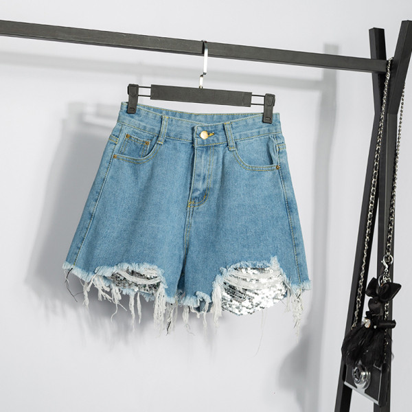 Didelio dydžio moteriški šortai aukštu liemeniu, plėšytais motyvais ir blizgučiais