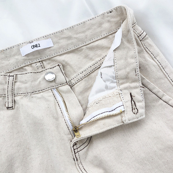 Moteriški džinsai aukštu liemeniu