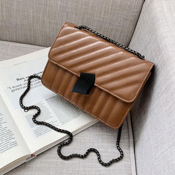 Geantă de damă modernă din piele cu închizătoare și lanț metalic