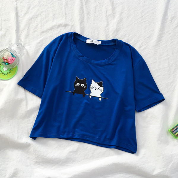 Laisva moteriška palaidinė su apvalia iškirpte ir aplikacijomis