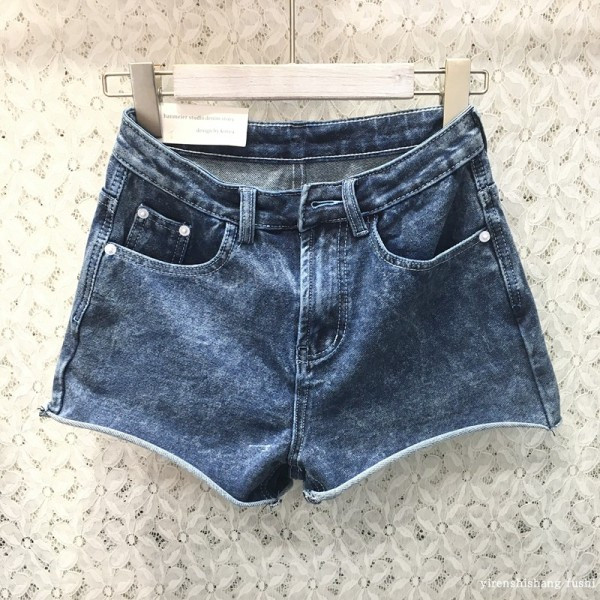 Naiste kõrge vöökohaga teksad