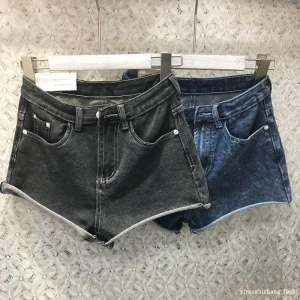 Naiste kõrge vöökohaga teksad