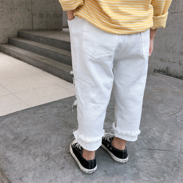 Pavasariniai vaikiški džinsai mergaitėms su tampriu juosmeniu ir plėšytais motyvais