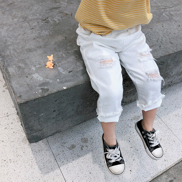 Pavasariniai vaikiški džinsai mergaitėms su tampriu juosmeniu ir plėšytais motyvais