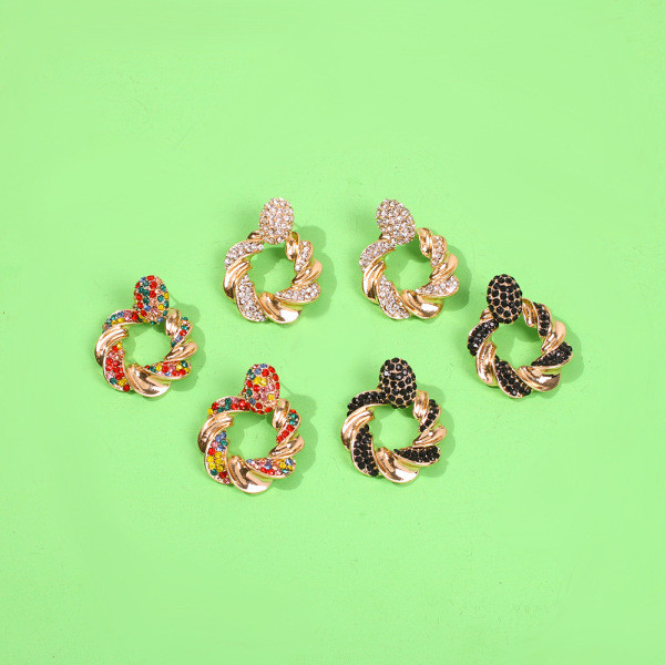 Moteriški apvalūs auskarai su akmenukais