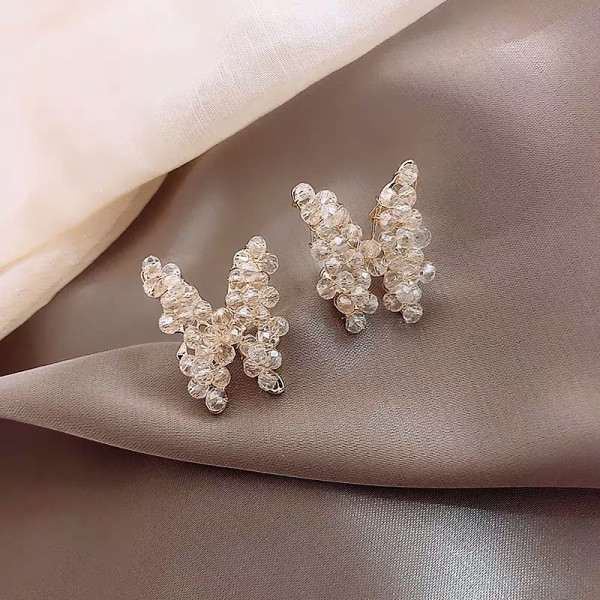 Subtilūs drugelio formos moteriški auskarai