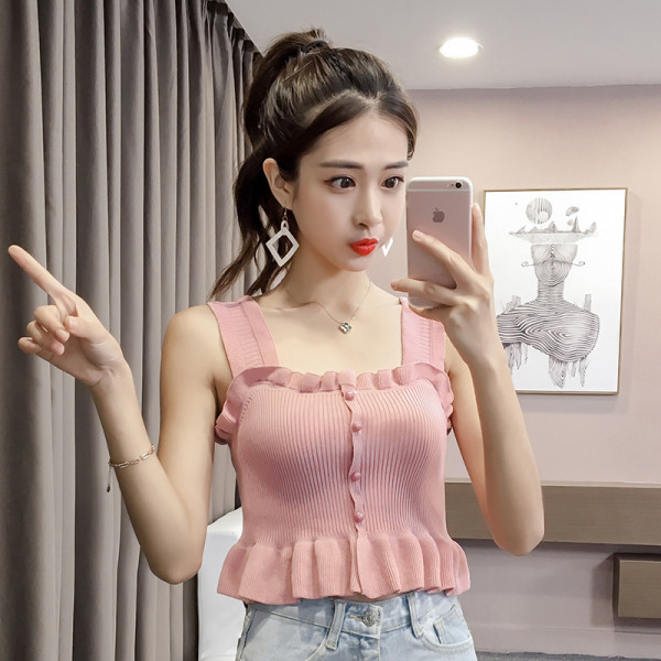 Lühike igapäevane topp õhukesest lokkidega kudumisest