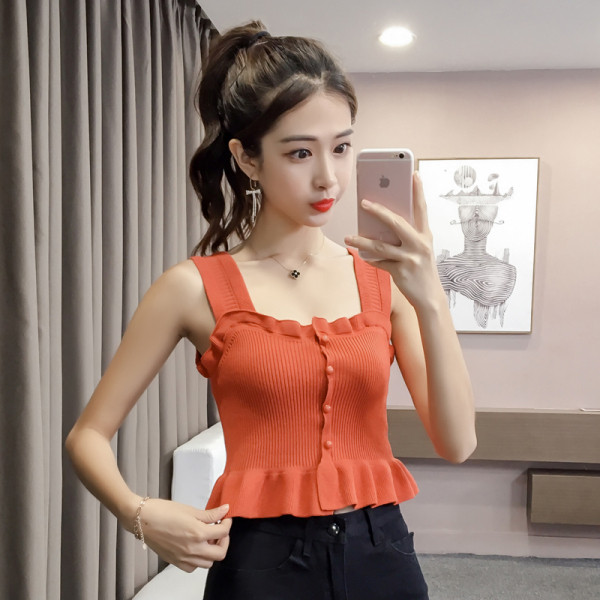 Lühike igapäevane topp õhukesest lokkidega kudumisest