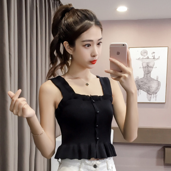 Lühike igapäevane topp õhukesest lokkidega kudumisest