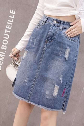 Naiste vabaaja kõrge vöökoha ja rebenenud motiiviga teksaseelik