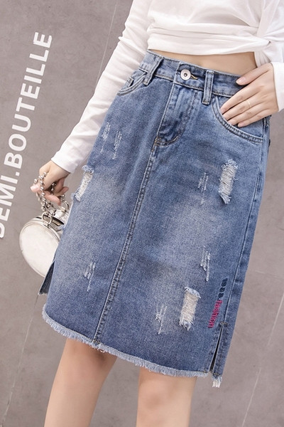 Naiste vabaaja kõrge vöökoha ja rebenenud motiiviga teksaseelik