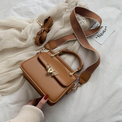 Moderni moteriška rankinė iš eko odos su dviem rankenomis