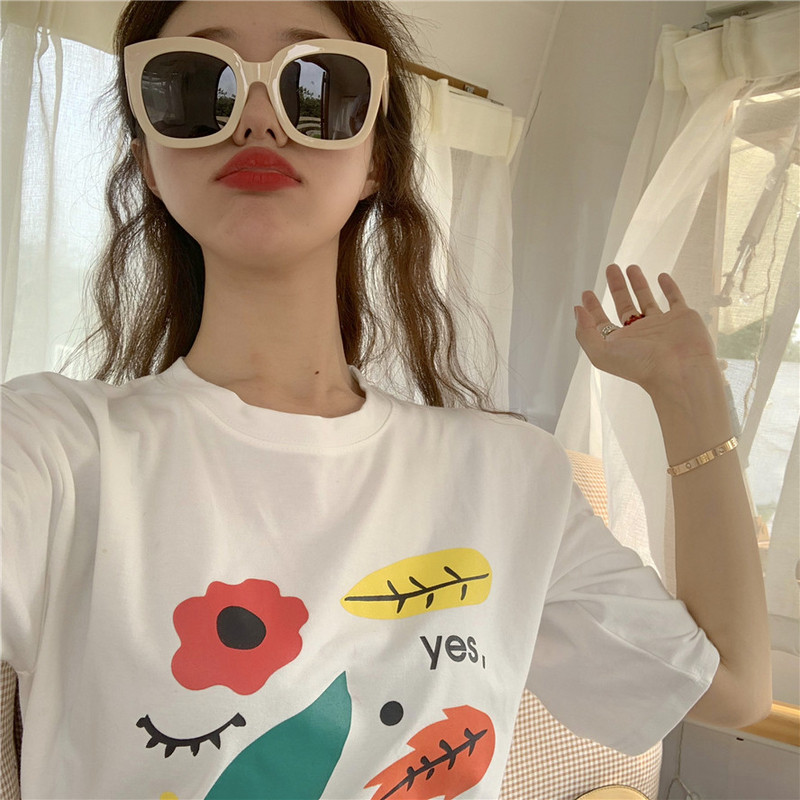 Moteriški laisvalaikio mėlyni marškinėliai su raštu