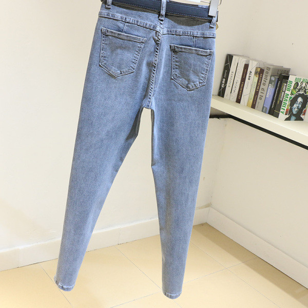 Laisvalaikiai moteriški džinsai Liekno modelio aukštu juosmeniu