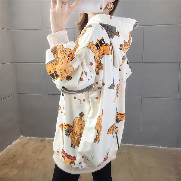 Modernūs moteriški megztiniai su gobtuvu ir raštu