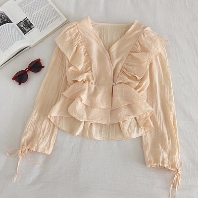 Šiuolaikiniai iškirpti moteriški marškiniai ilgomis rankovėmis ir V formos iškirpte