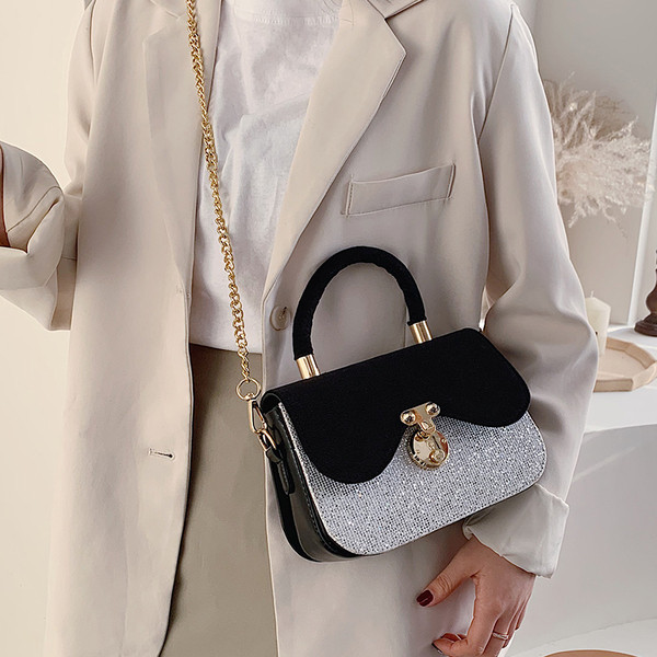 Moderni moteriška rankinė su metaline užsegimu ilga ir trumpa rankena