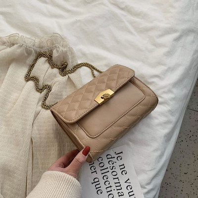 Moderni moteriška rankinė iš eko odos su ilga metaline grandinėle