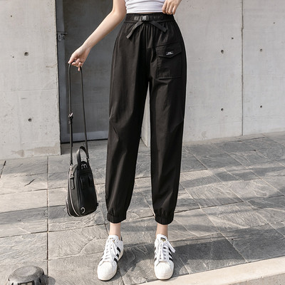 Moteriškos laisvalaikio kelnės su kišenėmis ir diržu