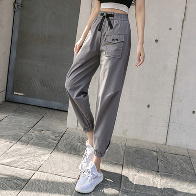 Moteriškos laisvalaikio kelnės su kišenėmis ir diržu