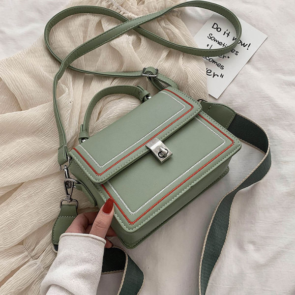 Moderna ženska torba od eko kože sa dugačkom tekstilnom ručkom