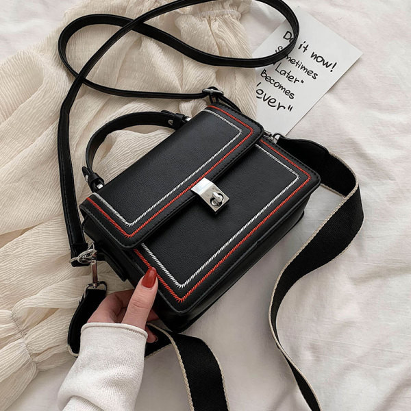 Moderna ženska torba od eko kože sa dugačkom tekstilnom ručkom