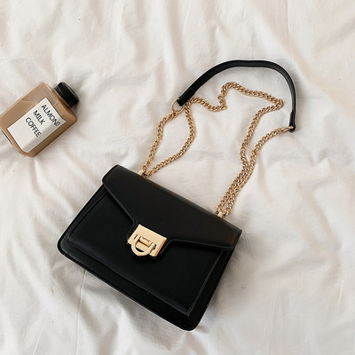 Geanta de dama din piele ecologica cu inchidere metalica