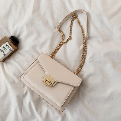 Geanta de dama din piele ecologica cu inchidere metalica