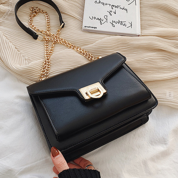 Geanta de dama din piele ecologica cu inchidere metalica