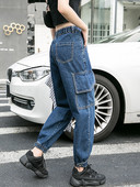 Plati sieviešu džinsi ar kabatām un elastīgu jostasvietu