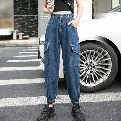 Plati sieviešu džinsi ar kabatām un elastīgu jostasvietu