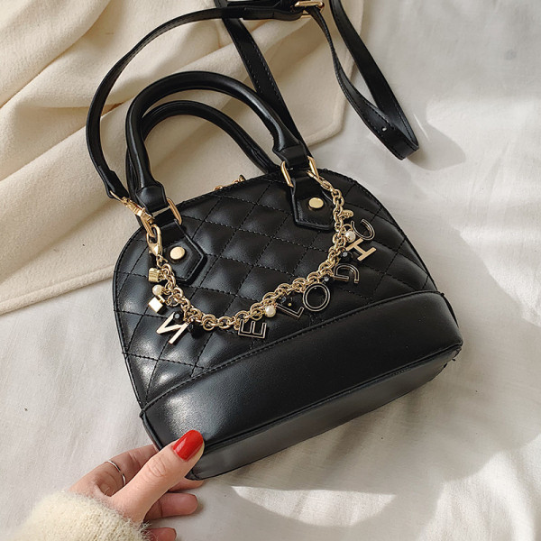 Moodne naiste kott luku ja ketiga