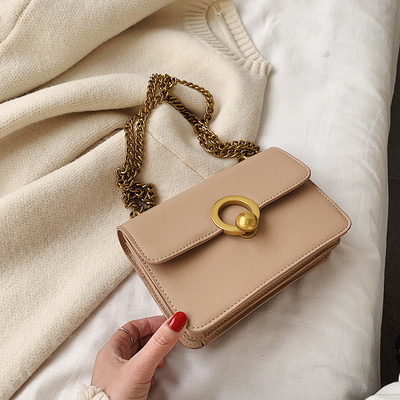 Moderna ženska torba od eko kože sa metalnim kopčanjem