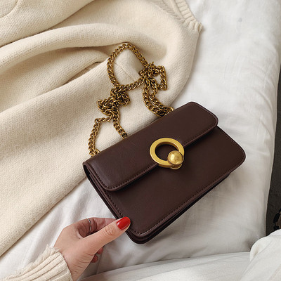 Moderna ženska torba od eko kože sa metalnim kopčanjem