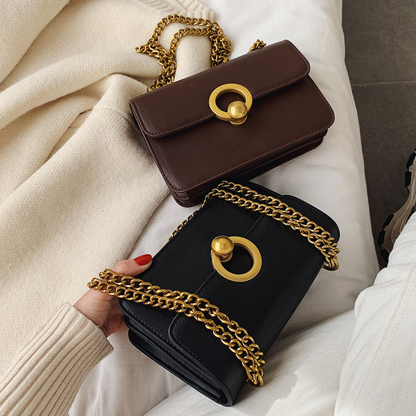 Moderna ženska torba od eko kože sa metalnim kopčanjem