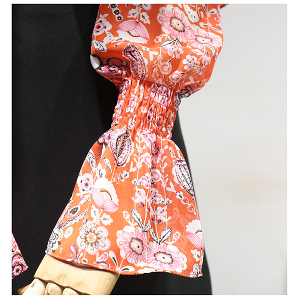 Uue mudeli madala kraega, tülli ja lillelise mustriga naiste pluus