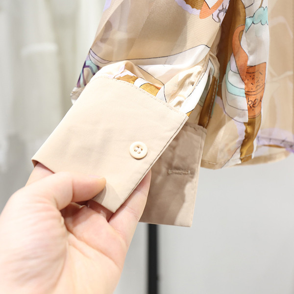 Moteriški marškiniai su kaspinu ir šifono raštu