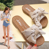 Sieviešu ikdienas čības ar plakanu zoli un lentu ar spīdīgu efektu