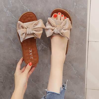 Sieviešu ikdienas čības ar plakanu zoli un lentu ar spīdīgu efektu