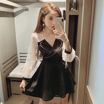 Retro stiilis naiste kleit pikkade varrukate ja spitsikaelusega