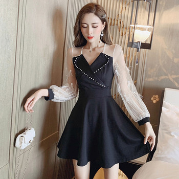 Retro stiilis naiste kleit pikkade varrukate ja spitsikaelusega