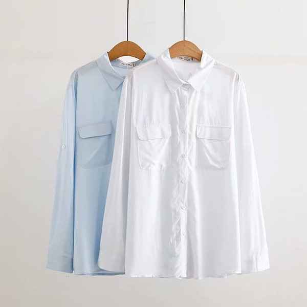 Elegantna ženska košulja s klasičnim ovratnikom i džepovima
