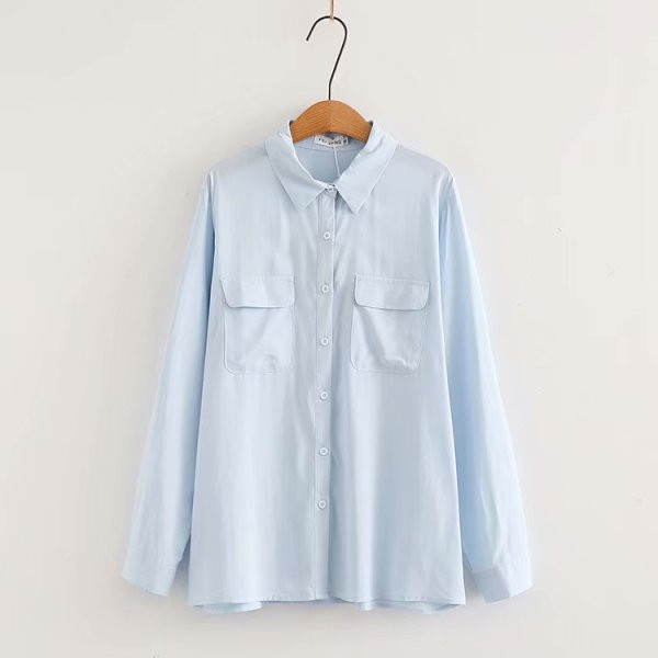 Elegantna ženska košulja s klasičnim ovratnikom i džepovima