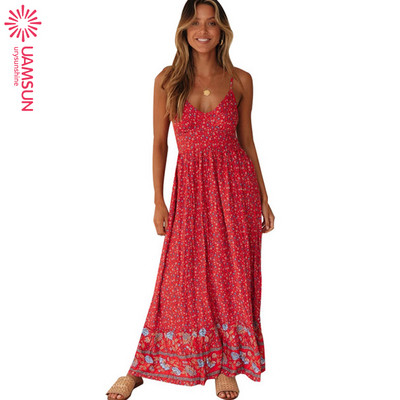 Laisva moteriška ilga suknelė su plonais petnešėlėmis, tinkanti pavasariui ir vasarai